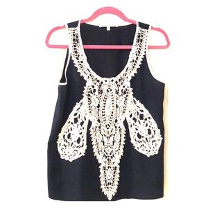 Navy sleeveless blouse with lace on front
